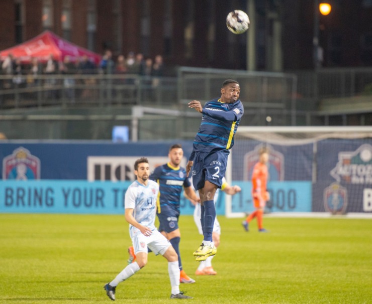 <strong>Indy Eleven midfielder Andrew Carleton undercuts Memphis 901 FC forward Pierre da Silva in the season opener at AutoZone Park Saturday, March 7, 2020. Indy scored 3 goals in the final period to overtake Memphis 4-2.</strong> (Greg Campbell/Special to The Daily Memphian)