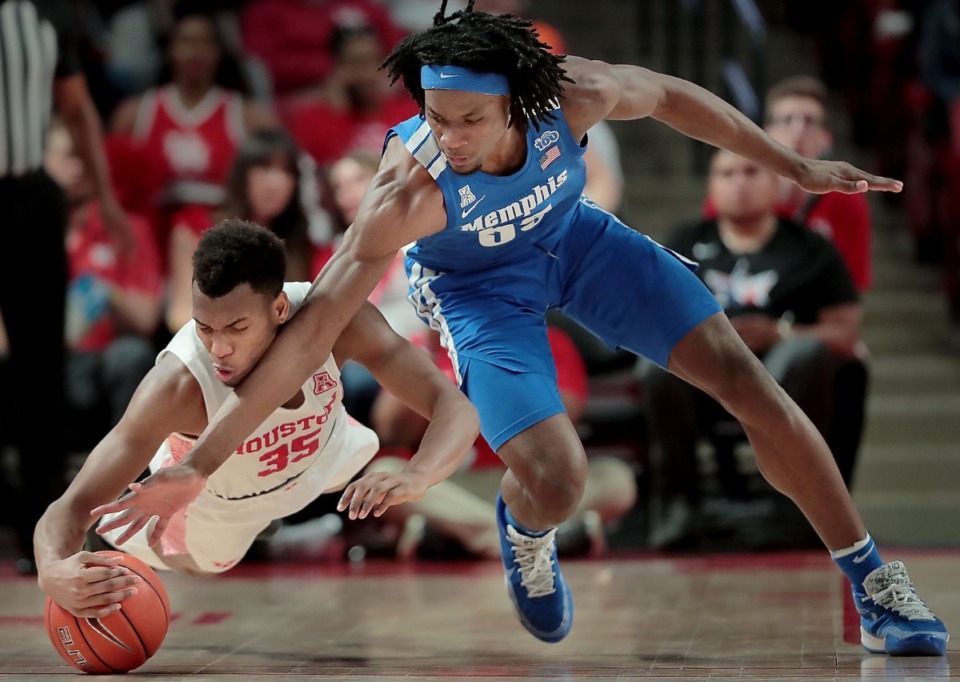 <strong>University of Memphis forward Precious Achiuwa tries to make a steal from Houston's Fabian White (35) during the Tigers' game against the Cougars at the Fertitta Center in Houston on March 8, 2020.</strong> (Jim Weber/Daily Memphian)