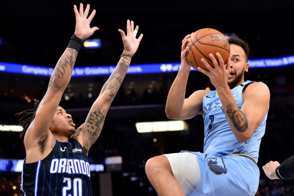 <strong>Memphis Grizzlies forward Kyle Anderson (1) attempts a shot over Orlando Magic guard Markelle Fultz (20)</strong>&nbsp;<strong>on March 10, 2020, at FedExForum.</strong> (Brandon Dill/AP)