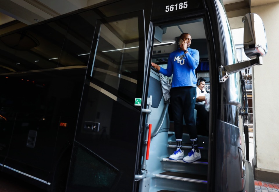 <strong>Memphis head coach Penny Hardaway stands on the team bus before heading to the airport on Thursday, March 12, 2020, in Fort Worth. Early in the day, American Athletic Conference officials announced the cancellation of the men&rsquo;s conference basketball tournament.</strong> (Mark Weber/Daily Memphian)