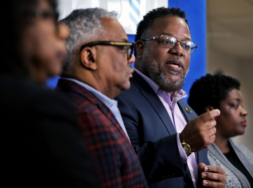 <strong>State Rep. Antonio Parkinson (center) speaks to the media during a March 13, 2020, gathering of North Memphis elected officials and community leaders at the Golden Gate Cathedral Church. The group, including Memphis City Councilwoman Rhonda Logan (right) and Golden Gate Cathedral Church bishop Ed Stephens (left), addressed the potentially disproportionate effects the coronavirus pandemic will have on their communities.</strong> (Patrick Lantrip/Daily Memphian)