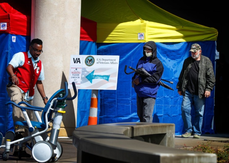 <strong>A man leaves the Memphis VA Medical Center wearing a mask on Wednesday, March 11, 2020. Due to the coronavirus pandemic, the hospital is using tents to pre-screen ayone who enters the facility.</strong> (Mark Weber/Daily Memphian)