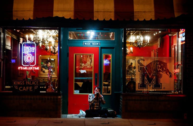 <strong>Harmonica player Micheal Blumenthal performs in front of the empty Kings Palace Cafe on St. Patrick&rsquo;s Day Tuesday, March 17, 2020 on Beale Street.</strong> (Mark Weber/Daily Memphian)