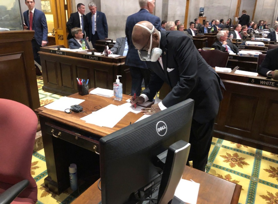 <strong>State Rep. G.A. Hardaway, D-Memphis, wears a mask during House floor proceedings in Nashville on Thursday, March 19, 2020, amid the coronavirus pandemic.</strong> (AP Photo/Jonathan Mattise)