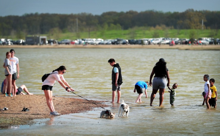 <strong>The first good weather in weeks brought folks out to Shelby Farms on March 26, 2020. They still remained spaced out, for the most part, as recommended by the CDC. </strong>(Jim Weber/Daily Memphian)