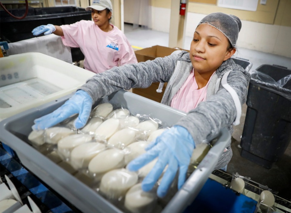 <strong>Elsa Sasla (right) and Samantha Soto (left) package soap at Vanguard Soap on Friday, March 27.</strong> (Mark Weber/Daily Memphian)
