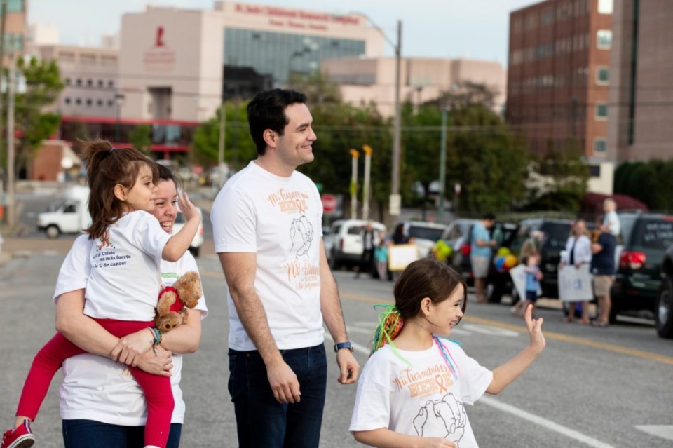 <strong>Isabella, a 4-year-old patient at St. Jude Children&rsquo;s Research Hospital, and her family are cheered with an end-of-chemo parade from Holy Rosary students. At a distance, of course.</strong> (Submitted)