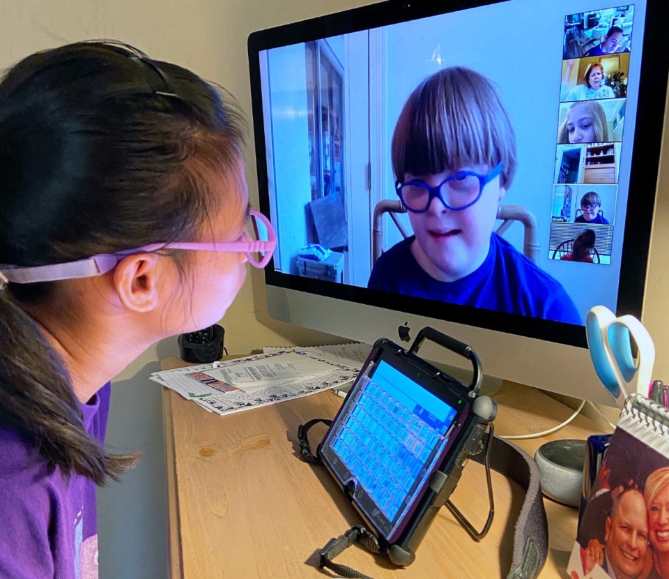 <strong>Madonna Learning Center students Hannah and Murphy video chat with each other by video as a way to stay in touch with classmates while school is closed.</strong> (Submitted/Madonna Learning Center)