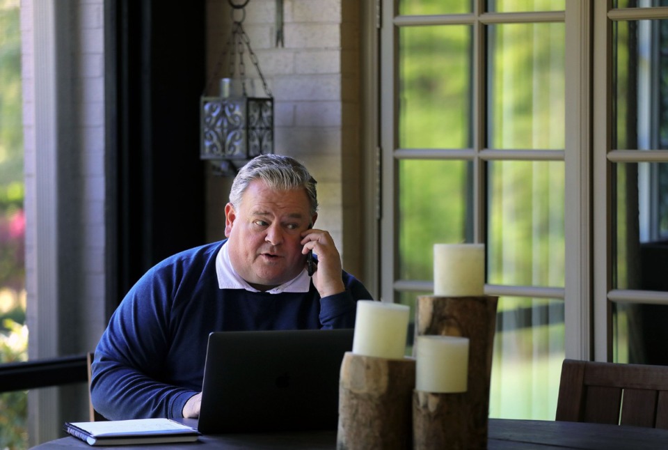 <strong>Jimmy Sexton talks by phone from his back porch April 10, 2020, where the sports agent has handled most of his business since the outbreak of COVID-19 hit the United States.</strong> (Patrick Lantrip/Daily Memphian)