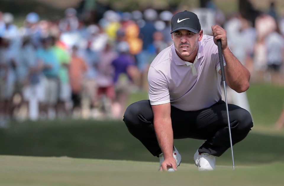 <strong>Brooks Koepka lines up a putt on the 17th green during the third round of tournament play at the WGC-FedEx St. Jude Invitational at Southwind on July 27, 2019.</strong> (Jim Weber/Daily Memphian file)