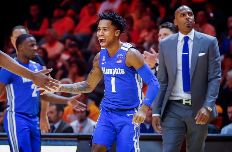 <strong>Memphis guard Tyler Harris (middle) celebrates during a timeout during action against Tennessee Saturday, Dec. 14, 2019 in Knoxville, Tenn.</strong> (Mark Weber/Daily Memphian)