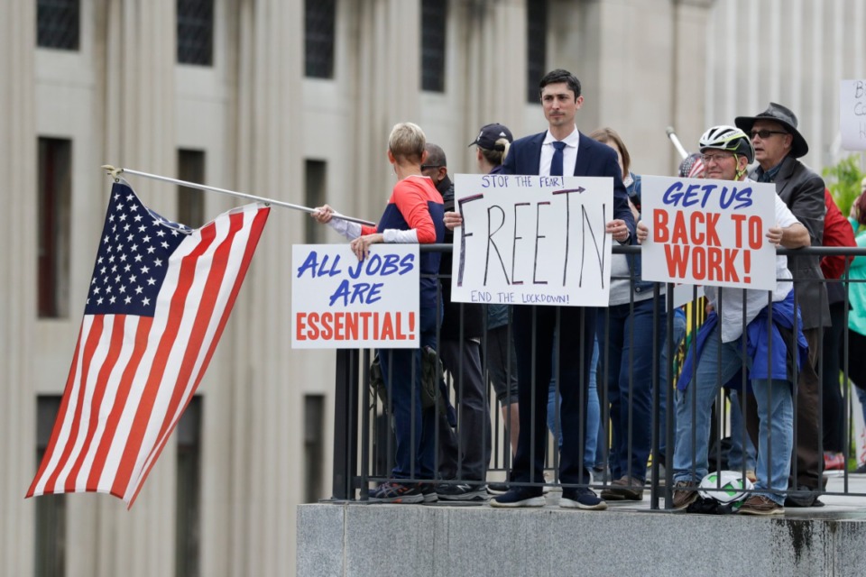 <strong>Protesters rally at the Tennessee state capitol to speak out against the state's handling of the COVID-19 outbreak Sunday, April 19, 2020, in Nashville, Tennessee. Tennessee is under a stay-at-home order due to the coronavirus outbreak except for essential workers.</strong> (AP Photo/Mark Humphrey)