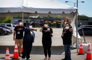 <strong>Christ Community Health Services staff members setup a drive-thru COVID-19 testing site on Friday, April 17, 2020 in the Mendenhall Square Shopping Center. Christ Community will be opening virus testing sites in low-income area of Memphis starting this weekend.</strong> (Mark Weber/Daily Memphian)