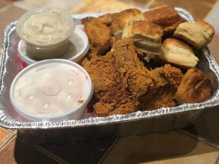 <strong>The family meal for four at Joes on Highland is $31.99 and comes with eight pieces of chicken, two sides and biscuits.</strong> (Jennifer Biggs/Daily Memphian)