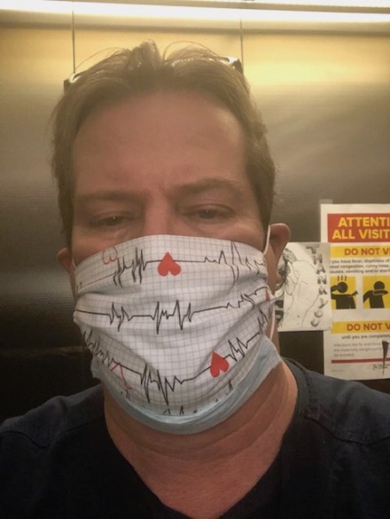 <strong>Nurse Todd Maxwell models one of the cloth masks sewn and donated by a church group in Memphis.</strong> (Submitted)
