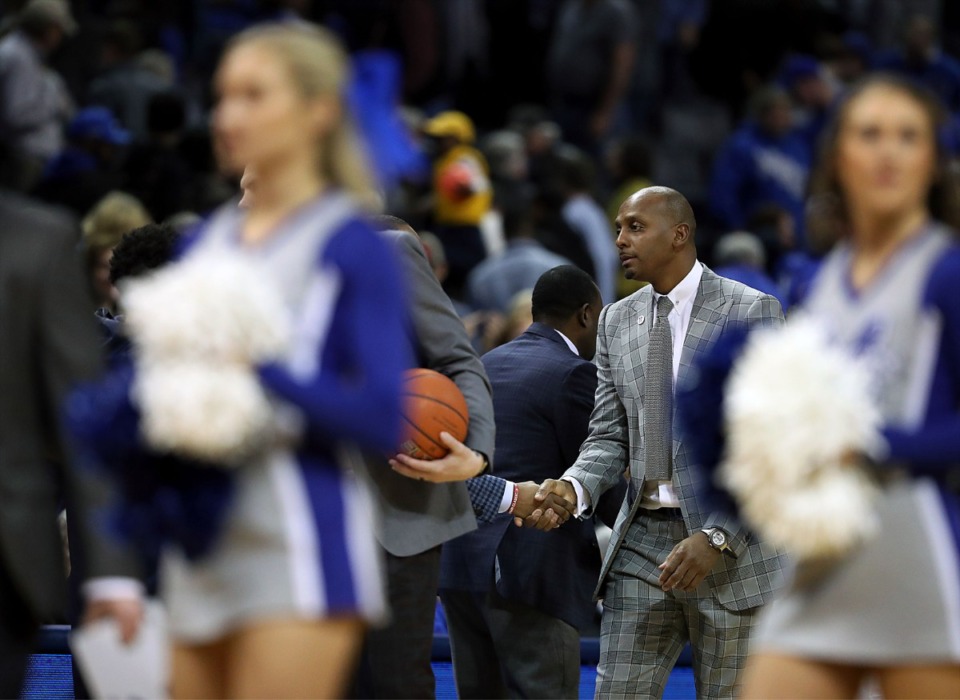 <strong>University of Memphis head coach Penny Hardaway shakes hands with a University of Connecticut coach after his Tigers beat the Huskies 78-71 Sunday, Feb. 10, 2019.</strong> (Patrick Lantrip/Daily Memphian file)