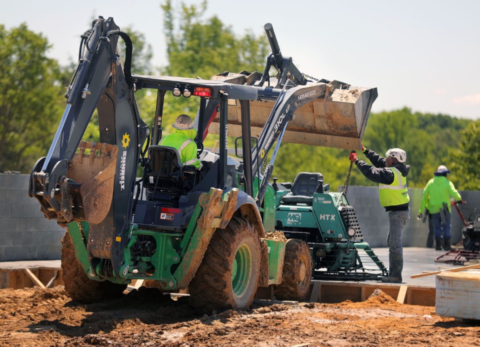 <strong>Construction crews lay the foundation of the first structures at the Lake District mixed-use development in Lakeland on Thursday, April 30.</strong> (Patrick Lantrip/Daily Memphian)