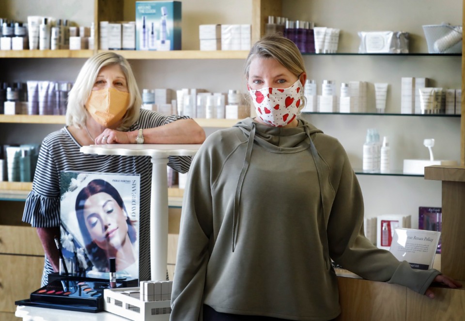 <strong>"Mother&rsquo;s Day is usually a big time of year for us. May is usually a pretty big month. We&rsquo;ll just have to wait and see,&rdquo; said Merle Norman Cosmetics owner Kelley Dennis (right) with store manager Angela Thompson. </strong>(Mark Weber/Daily Memphian)
