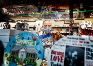 <strong>Boulevard Souvenirs employee Colleen Brown stocks the store shelves Monday, May 4, 2020.</strong>&nbsp;(Mark Weber/Daily Memphian)