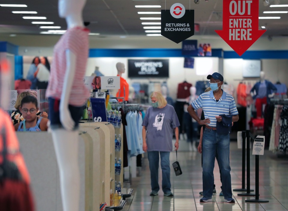 <strong>Customers wait to checkout in red-lined sections that are six feet apart inside a Southaven JCPenney May 14, 2020.</strong> (Patrick Lantrip/Daily Memphian)