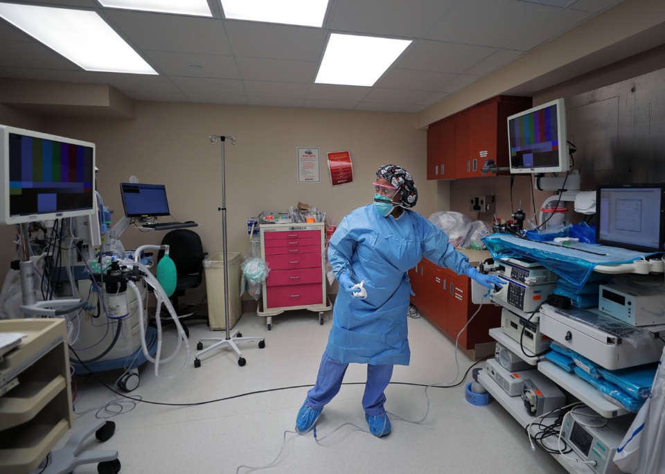 <strong>Surgical tech Tasha Smith sets up and disinfects a gastrointestinal laboratory for an incoming patient at Methodist University Hospital May 14, 2020.</strong> (Patrick Lantrip/Daily Memphian)