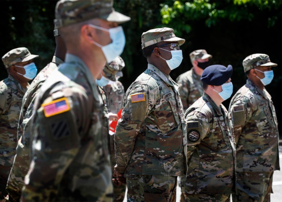 <strong>Members of the Army National Guard attend a Monday, May 18, press conference outside the building that housed the Commercial Appeal newspaper. The Union Avenue building is being&nbsp;</strong><span><strong>transformed into a COVID-19 alternate care site, the only one in Tennessee.</strong>&nbsp;</span>(Mark Weber/Daily Memphian)