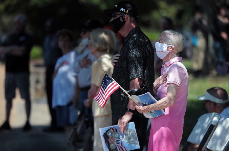 <strong>A small crowd gathered to pay their respects during a Memorial Day ceremony at Memorial Park Cemetery May 25, 2020.</strong> (Patrick Lantrip/Daily Memphian)