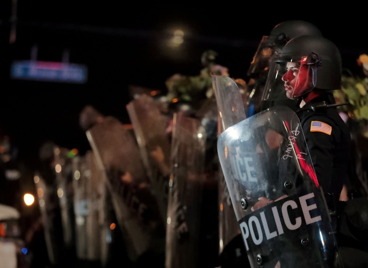 <strong>A Memphis Police officer looks out into the crowd during a May 28, 2020 protest over the death of George Floyd.</strong> (Patrick Lantrip/Daily Memphian)