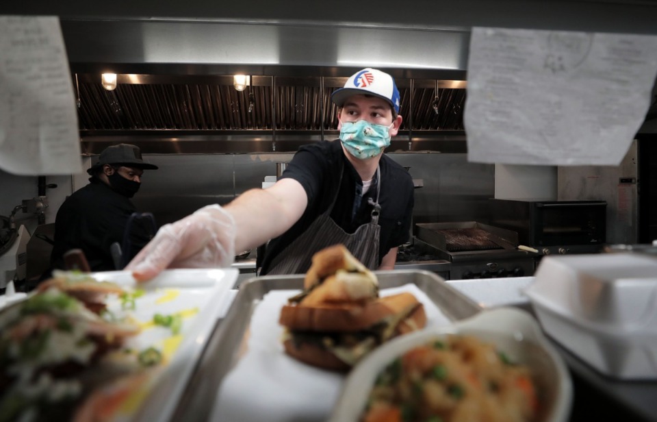 <strong>Magnolia &amp; May chef and owner Chip Dunham prepares a dish in his East Memphis restaurant May 27, 2020.</strong> (Patrick Lantrip/Daily Memphian)