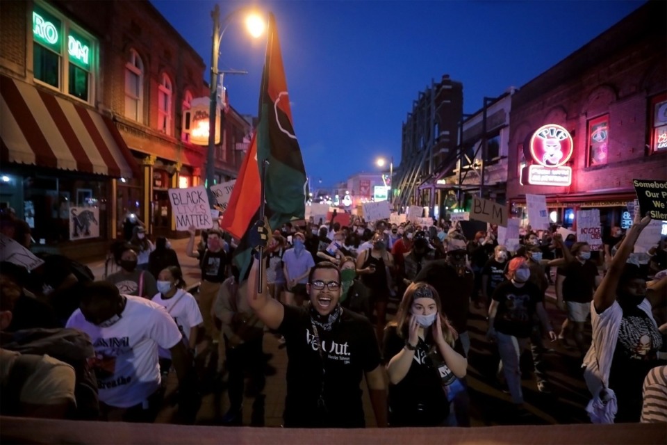 <strong>Several hundred people march down Beale Street during a May 29, 2020 march throughout Downtown Memphis to protest the murder of George Floyd by the Minneapolis Police.</strong> (Patrick Lantrip/Daily Memphian)