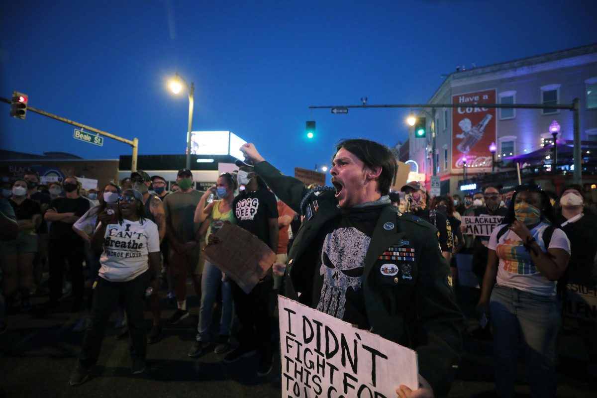 <strong>Protesters gather on Beale Street during a Friday, May 29, march throughout Downtown Memphis to protest the murder of George Floyd by the Minneapolis Police.</strong> (Patrick Lantrip/Daily Memphian)