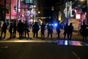 <strong>Police stand off against the last remnants of protesters early Monday, June 1.</strong> (Patrick Lantrip/Daily Memphian)