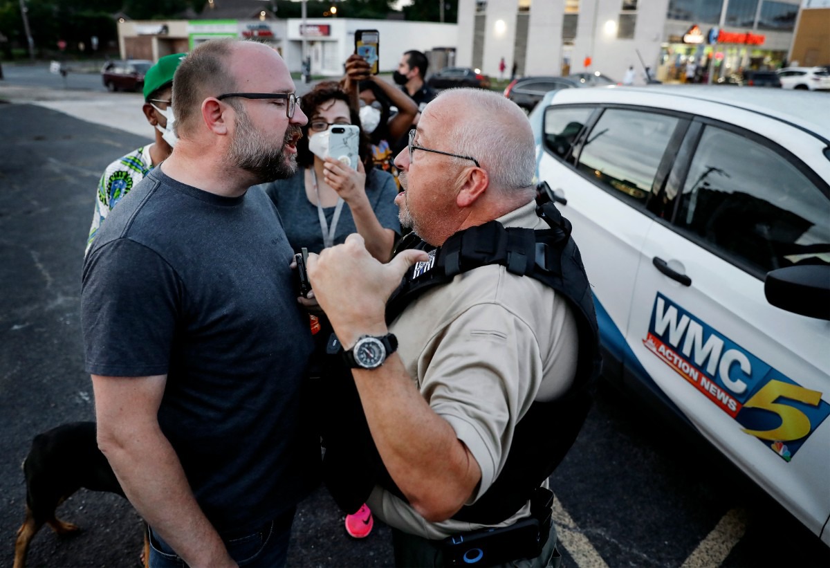 <strong>Activist Hunter Dempster (left) stands chest to chest while confronting a security guard hired by WMC-TV in Memphis on Monday, June 1, 2020, during a protest over the Minneapolis killing of George Floyd.</strong> (Mark Weber/Daily Memphian)