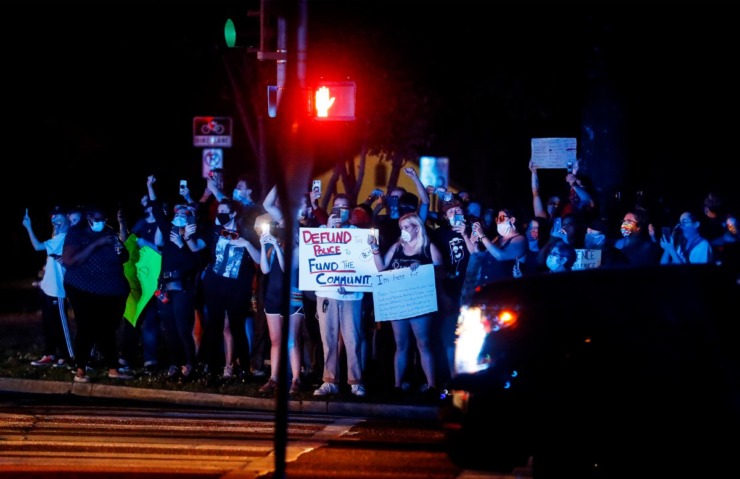 <strong>Protesters stand on the side of Germantown Parkway June 2, 2020.</strong> (Mark Weber/Daily Memphian)
