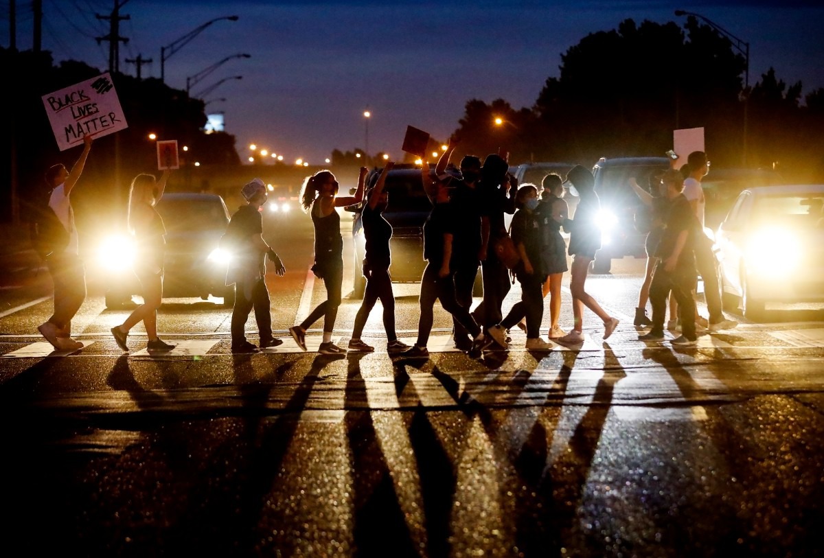 <strong>Protesters walking in front of cars on Germantown Road while blocking traffic on Tuesday, June 2, 2020, during a protest over the Minneapolis killing of George Floyd.</strong> (Mark Weber/Daily Memphian)