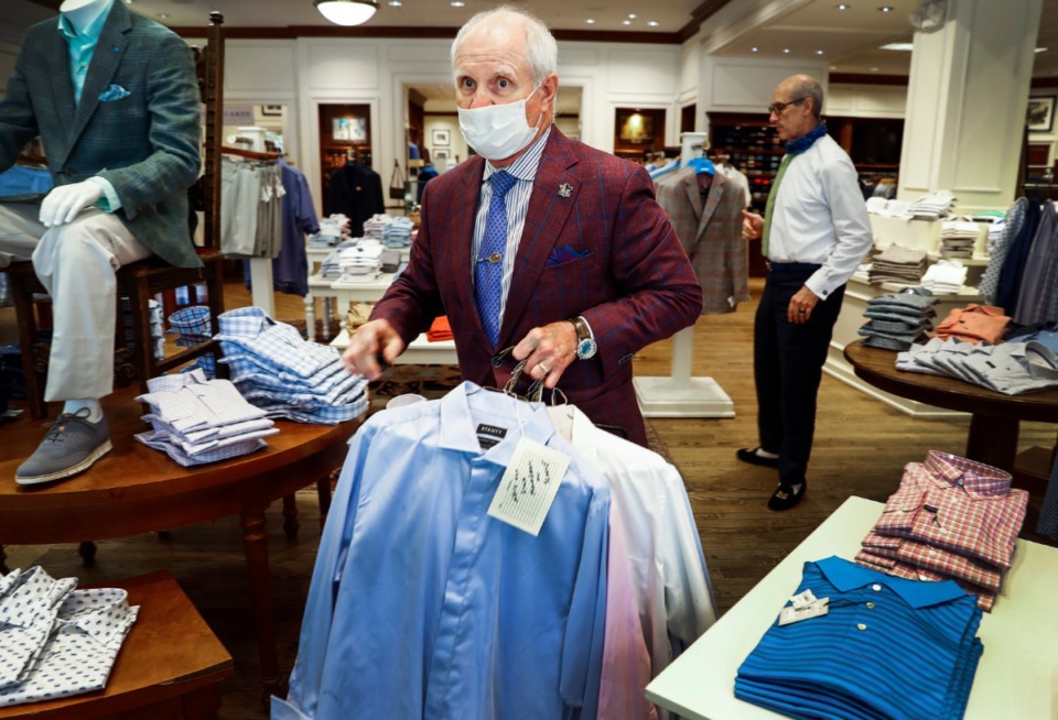 <strong>Retailers like clothing stores, boutiques and other non-essential businesses were allowed to open during Phase One of the city&rsquo;s and county&rsquo;s Back-to-Business Framework. Johnny Hall was among those working at the reopening of James Davis Monday, May 4, 2020 at Laurelwood Shopping Center.&nbsp;</strong>(Mark Weber/Daily Memphian file)