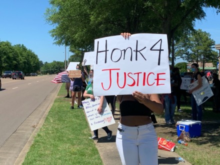 <strong>About 20 people held signs in a demonstration along Market Boulevard June 6, 2020. The event was the first of a few planned in Collierville.&nbsp;</strong>(Abigail Warren/Daily Memphian)