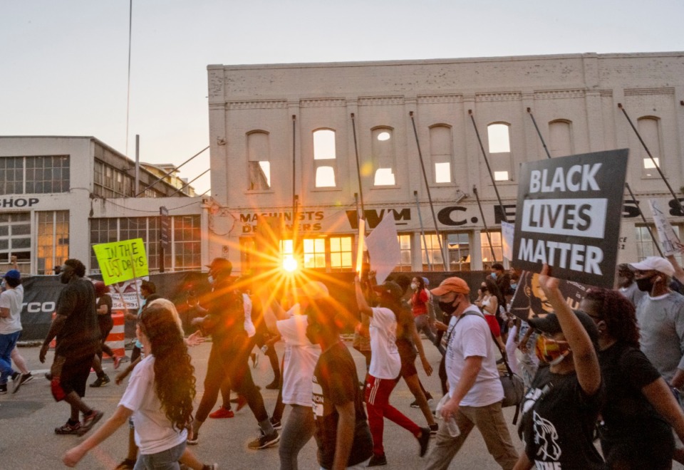 <strong>Protesters pass the construction of One Beale on Front Street during their peaceful march through downtown streets Saturday night June 6, 2020.</strong> (Greg Campbell/Special for The Daily Memphian)