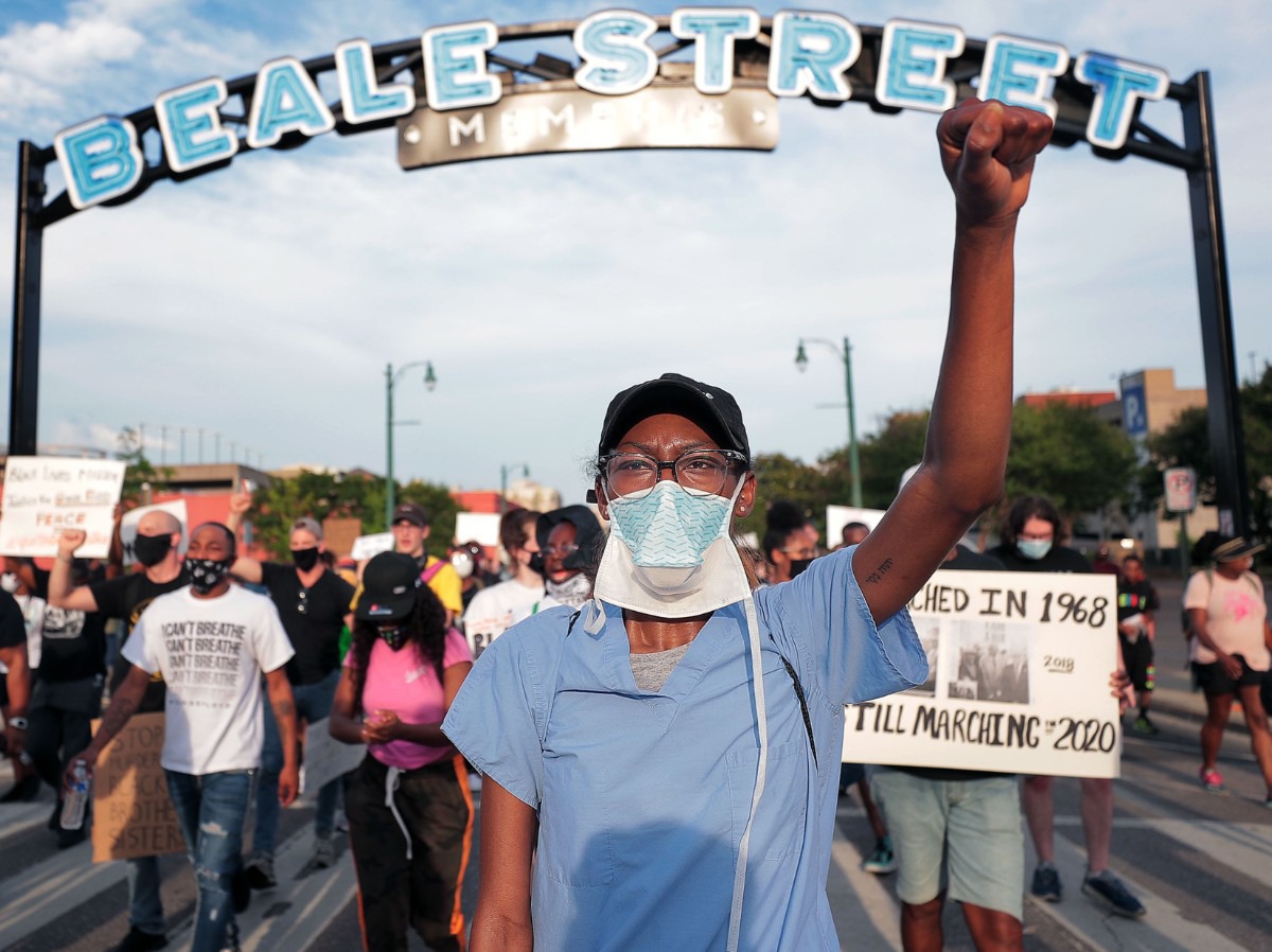 <strong>Protesters march down Beale Street June 7, 2020 during the twelfth night of protests over the death of George Floyd.</strong> (Patrick Lantrip/Daily Memphian)