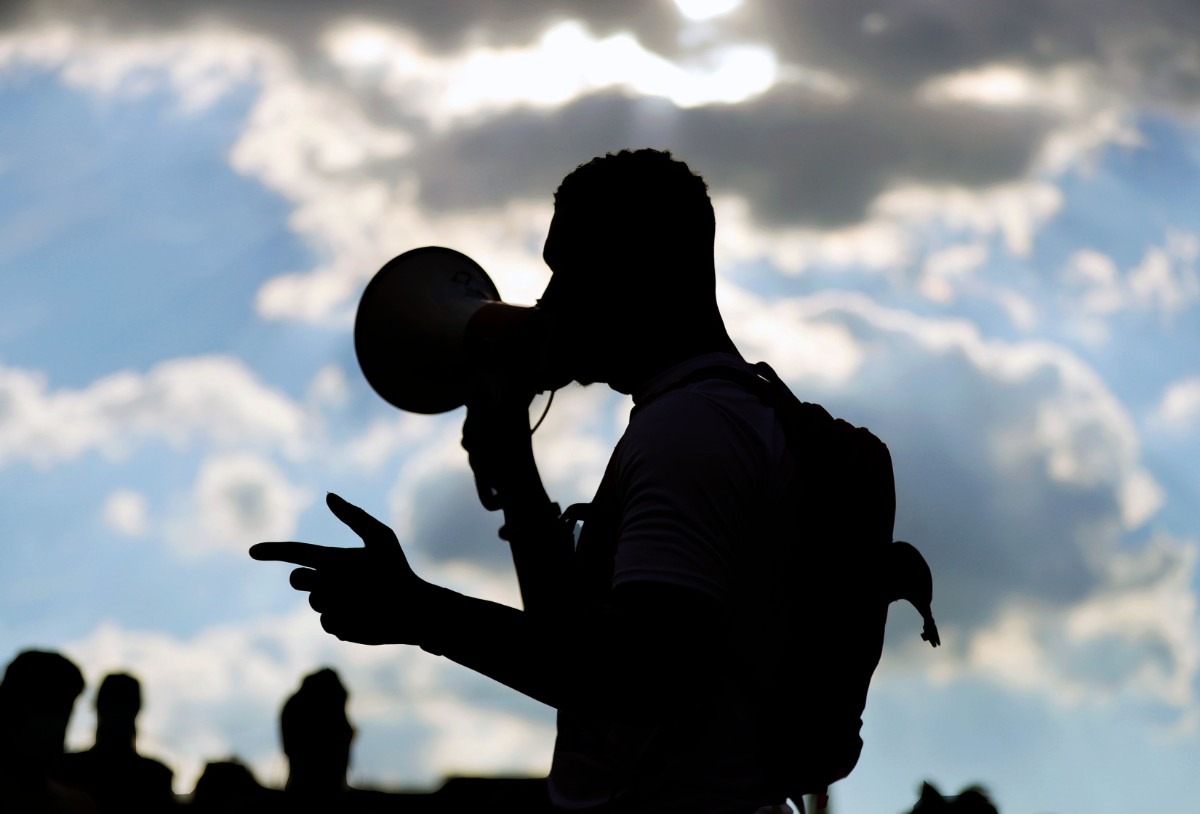 <strong>DeVante Hill speaks to a crowd gathered at I Am A Man Plaza June 7, 2020 for the twelfth night of protests over the death of George Floyd.</strong> (Patrick Lantrip/Daily Memphian)