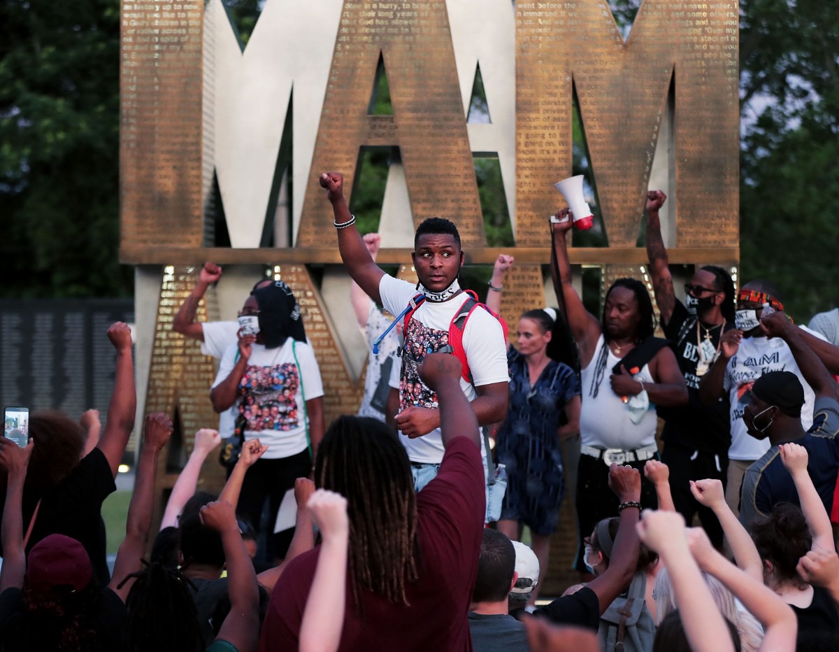 <strong>DeVante Hill asks the crowd gathered at I Am A Man Plaza to raise their fists in solidarity June 7, 2020 during the twelfth night of protests over the death of George Floyd.</strong> (Patrick Lantrip/Daily Memphian)