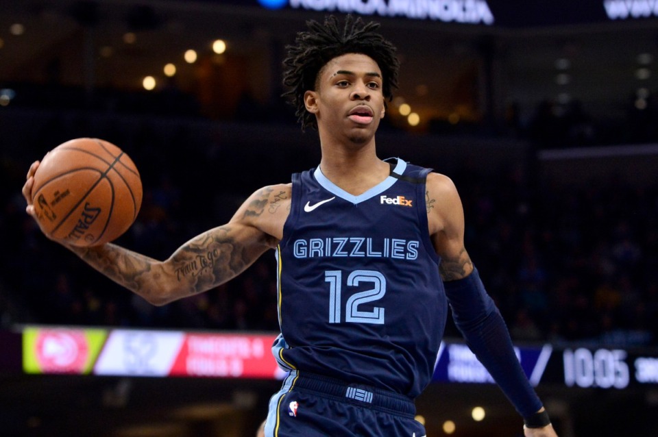 <strong>Memphis Grizzlies guard Ja Morant (12) plays in the second half of an NBA basketball game against the Atlanta Hawks Saturday, March 7, 2020, in Memphis, Tenn.</strong> (AP Photo/Brandon Dill)