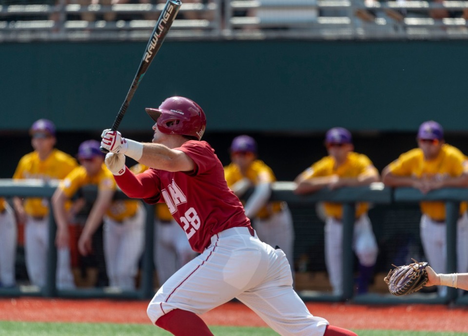 <strong>Alabama outfielder Tyler Gentry (28) hits a home run during a game against&nbsp; LSU on April 28, 2019, in Tuscaloosa, Ala.&nbsp;The former Arlington standout was chosen in the third round by the Kansas City Royals in the Major League Baseball 2020 player draft.</strong> (Vasha Hunt/Associated Press file)