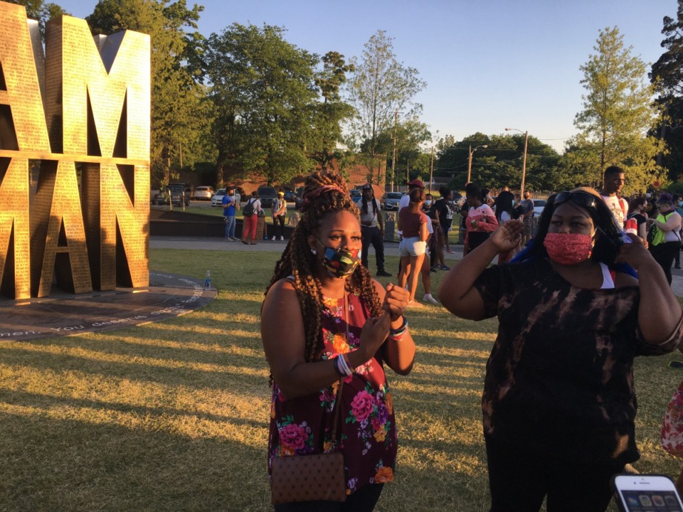 <strong>Kiera McGhee (left) and Tawanna Whalum organized the Deaf Black Lives Matter March. They marched Friday night from the National Civil Rights Museum through Downtown. They met DeVante Hill&rsquo;s group at the I Am A Man Plaza.</strong> (Daily Memphian)