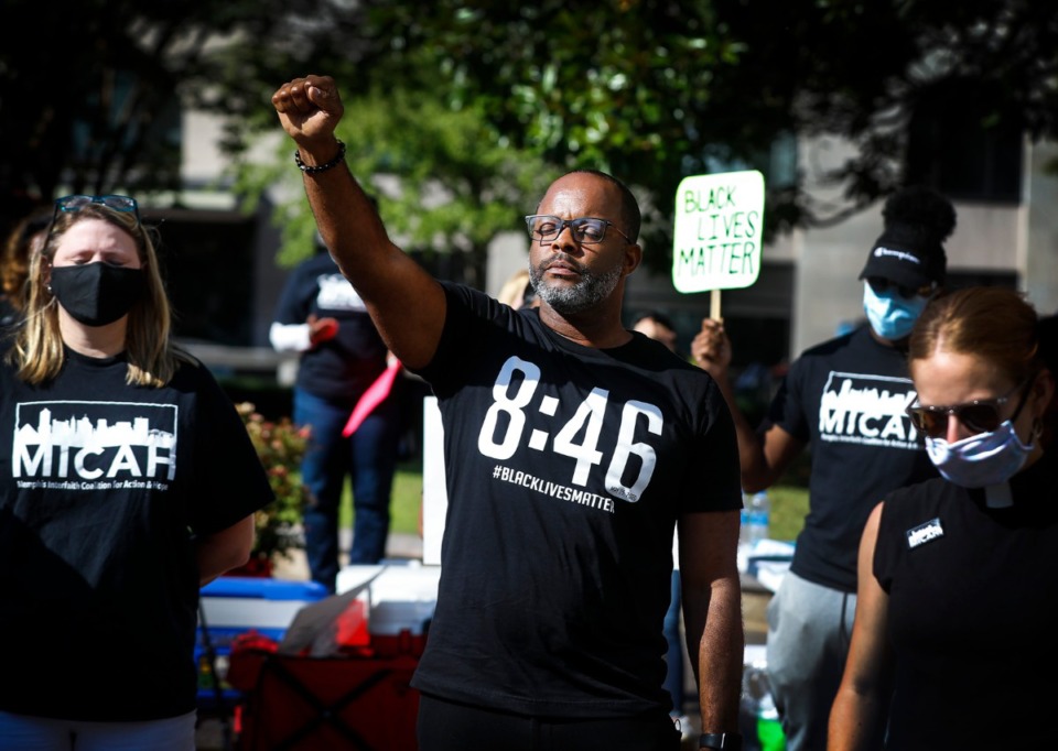 <strong>MICAH president Dr. Stacy Spencer leads a moment of silence during a rally on Tuesday, June 16, outside City Hall at 8:46 a.m.</strong> (Mark Weber/Daily Memphian)