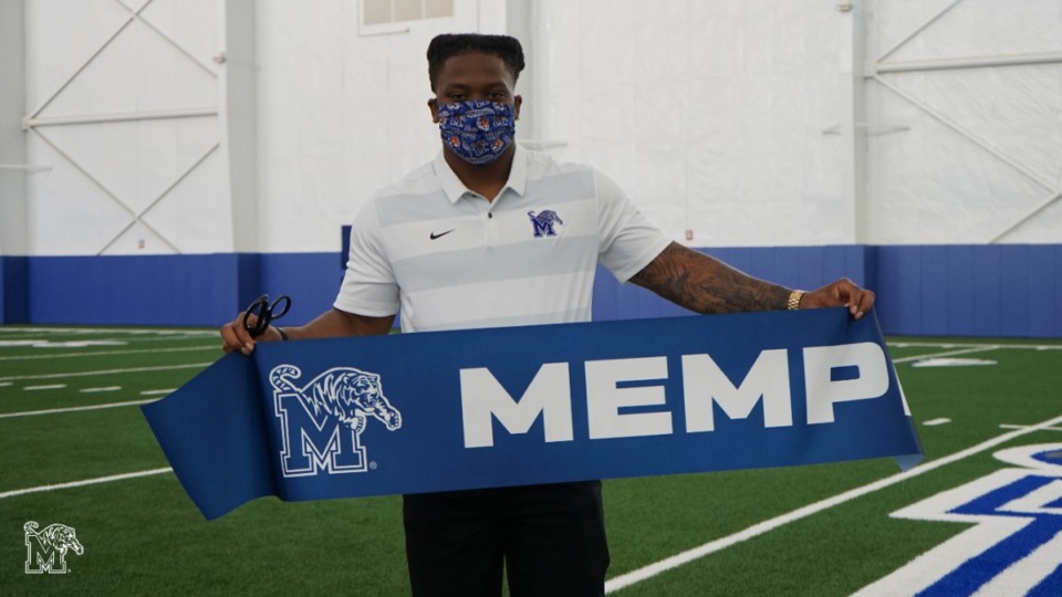 <strong>University of Memphis<span>&nbsp;senior linebacker JJ Russell participates in</span>&nbsp;the ceremonial ribbon-cutting for the new indoor practice facility on Wednesday, June 17, 2020.</strong><span>&nbsp;(Marcus Tompkins/Submitted photo)</span>