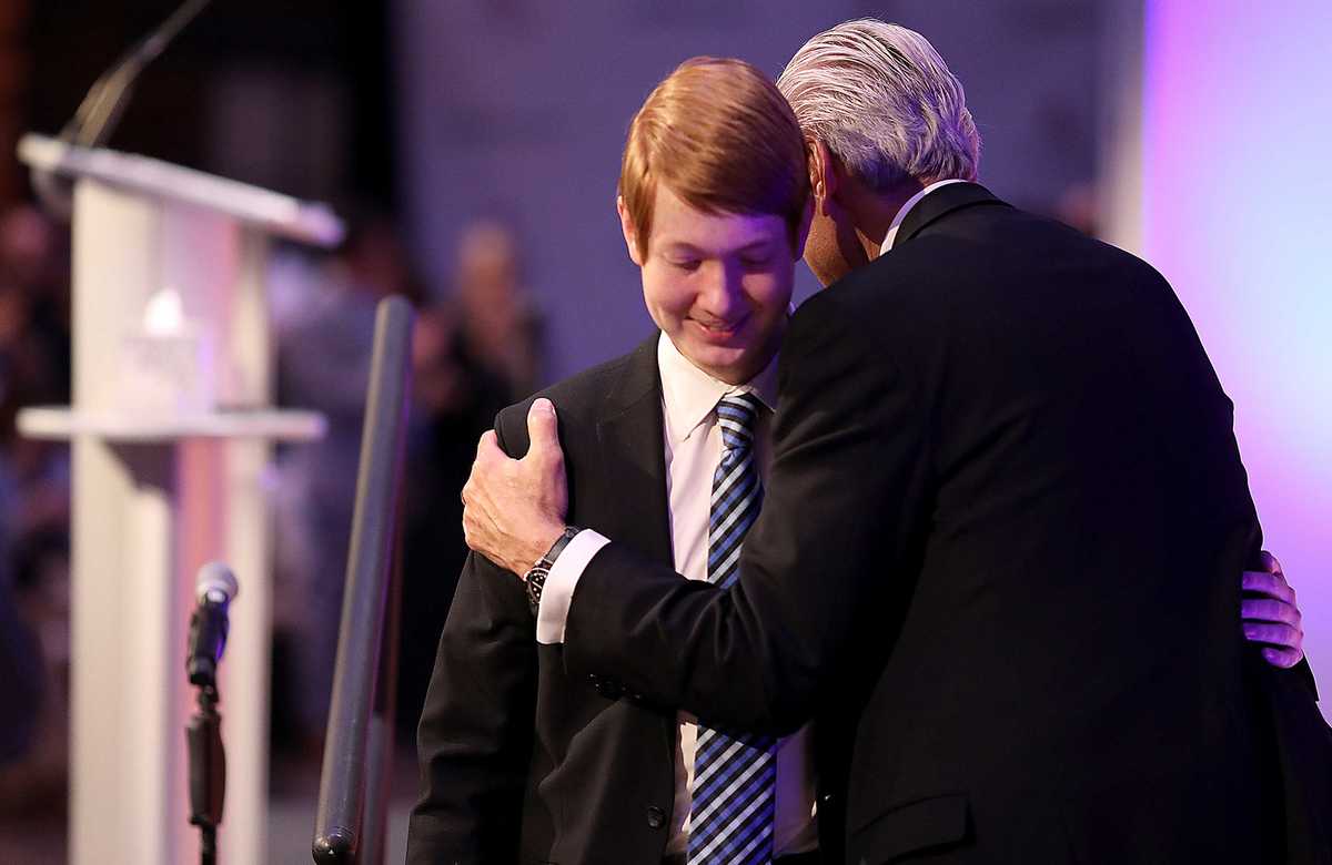 <strong>ALSAC CEO Richard Shadyac embraces high school cancer survivor Chandler Howard after the latter&rsquo;s speech during a press conference announcing the largest single donation in the history of St. Jude Children&rsquo;s Hospital.</strong>&nbsp;(Patrick Lantrip/Daily Memphian)