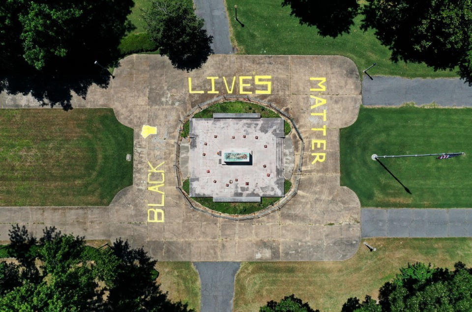 <strong>Protesters painted "Black lives matter" around the graves of KKK leader and Confederate general Nathan Bedford Forrest and his wife Mary Ann in Health Sciences Park on the evening of June 24, 2020, and the early morning hours of June 25.</strong> (Patrick Lantrip/Daily Memphian)