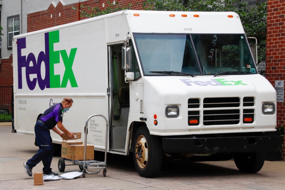 <strong>A FedEx Ground delivery takes place in Pittsburgh on Wednesday, June 3, 2020. As the company details the effect of COVID-19 on its bottom line, analysts want updates on efforts to increase volume and lower costs at FedEx Ground.&nbsp;</strong>(Gene J. Puskar/AP)