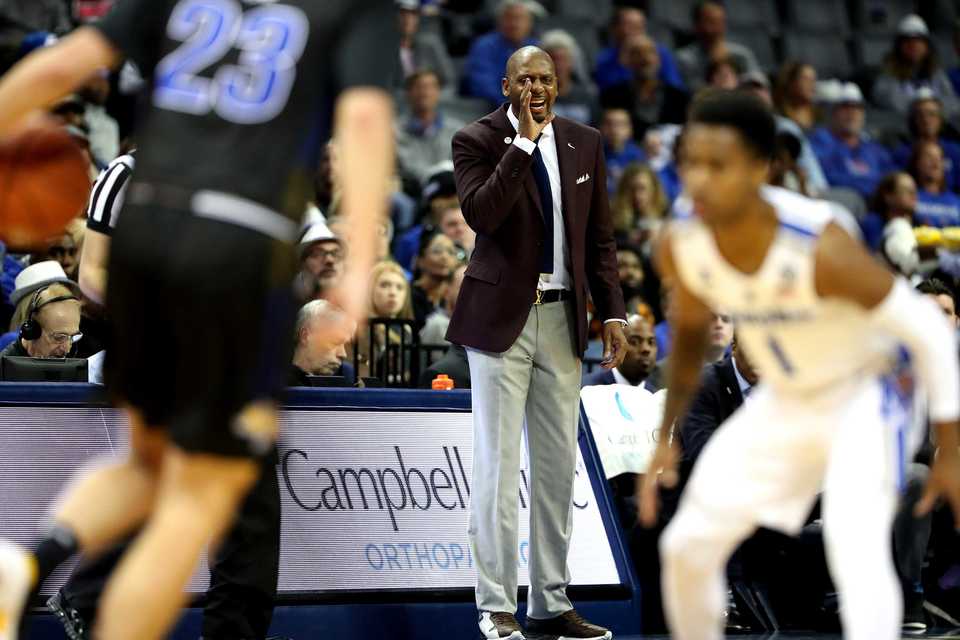 <strong>University of Memphis basketball coach Penny Hardaway shouts to his team as they run down the court.</strong> (Houston Cofield/Daily Memphian)